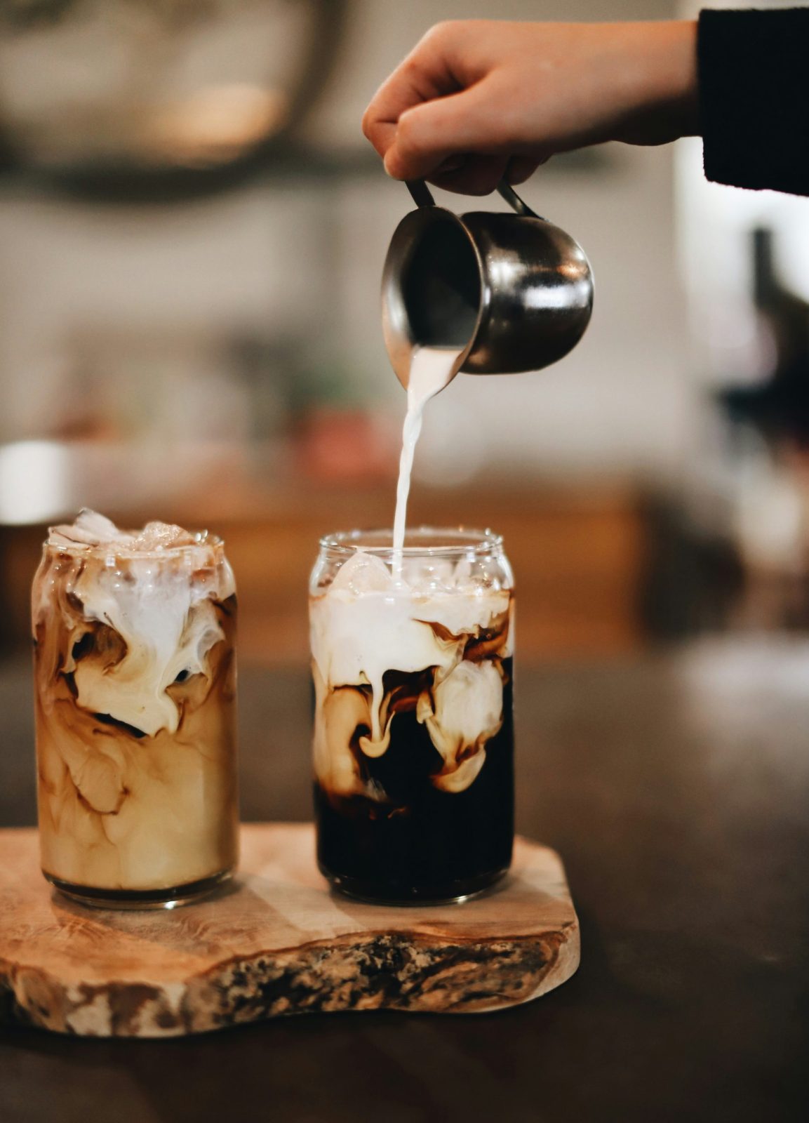 Layered iced coffee in a tall glass